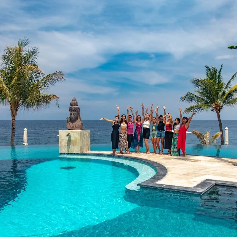 Women celebrating the end of a yoga retreat in Bali