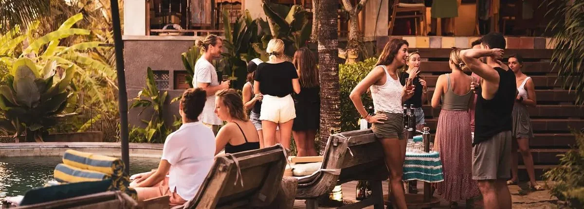 Group retreat gathering outside by the pool