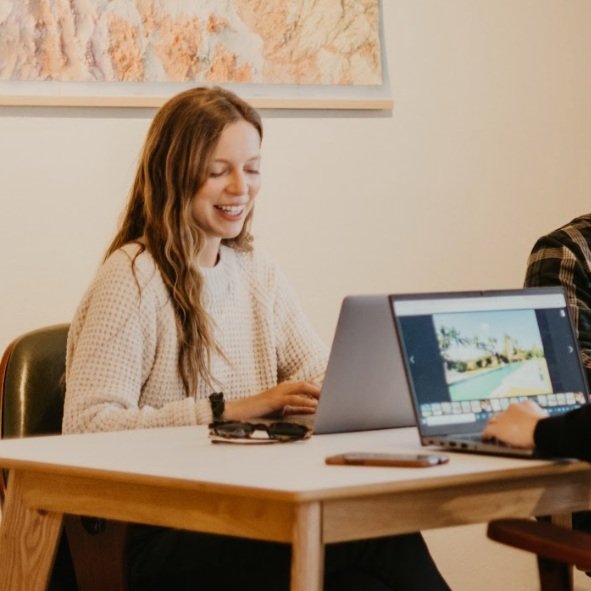 Christina Wiese working on a laptop at a desk