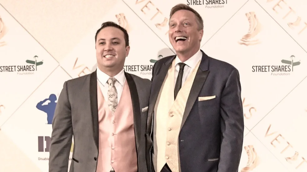 Todd Weiler and Husband AUSV member and veteran, Todd Weiler, shows off his red carpet smile, alongside his gallant husband. The two fiercely represented the uniqueness and beauty of our military and veterans community. Mr. Weiler was a 4th Vettys nominee for the Employment Award.