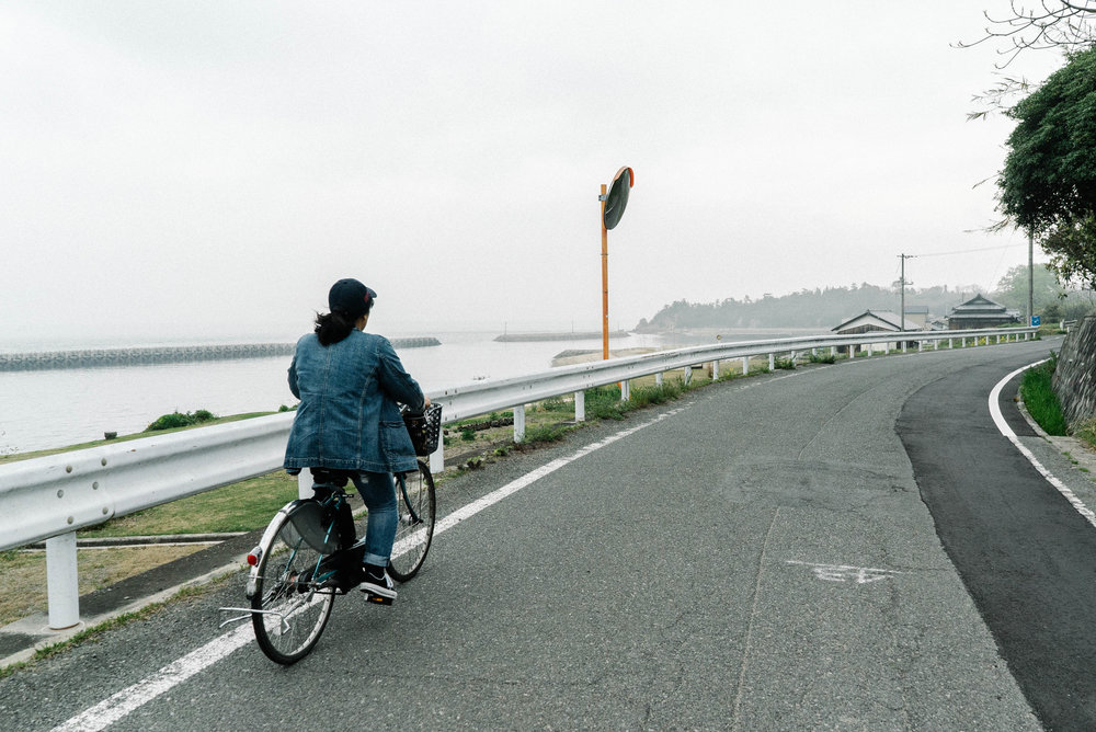  cycling through the local streets of Teshima 