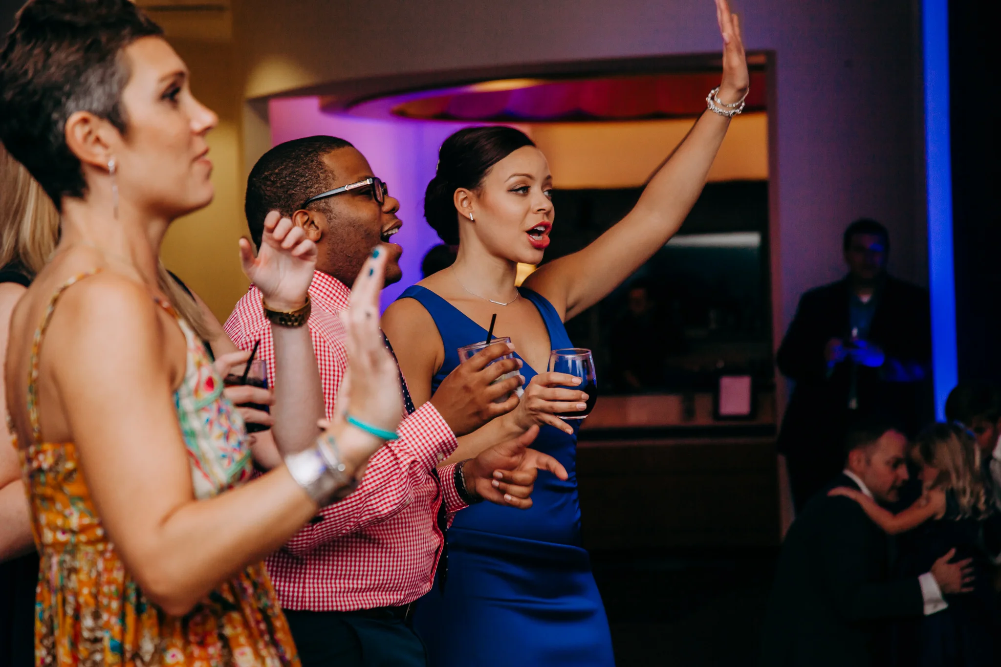 Candid wedding moment, couple and guests at intimate Kansas City wedding.