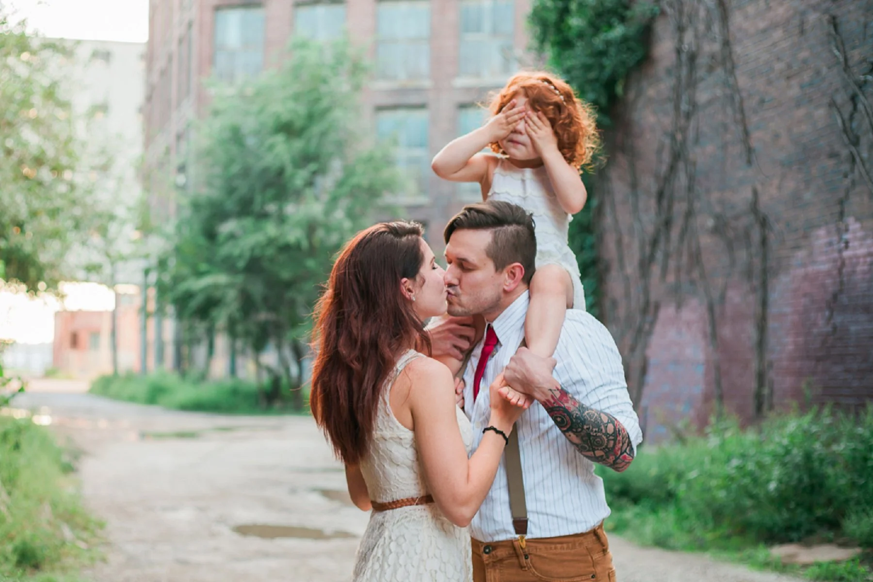 Family of three during family photo session in Kansas City.