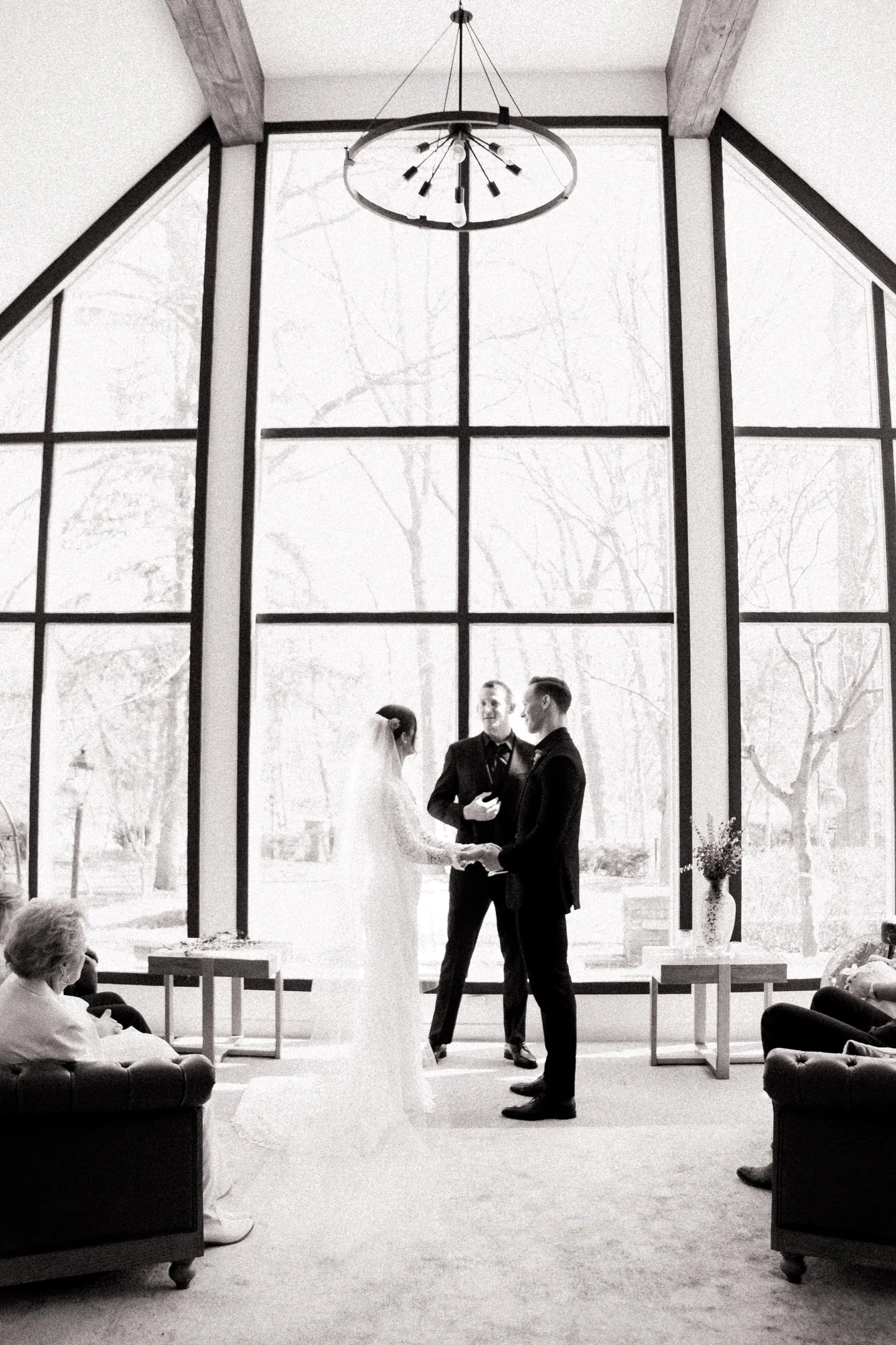 Bride and groom exchange vows at private estate wedding in Olathe.