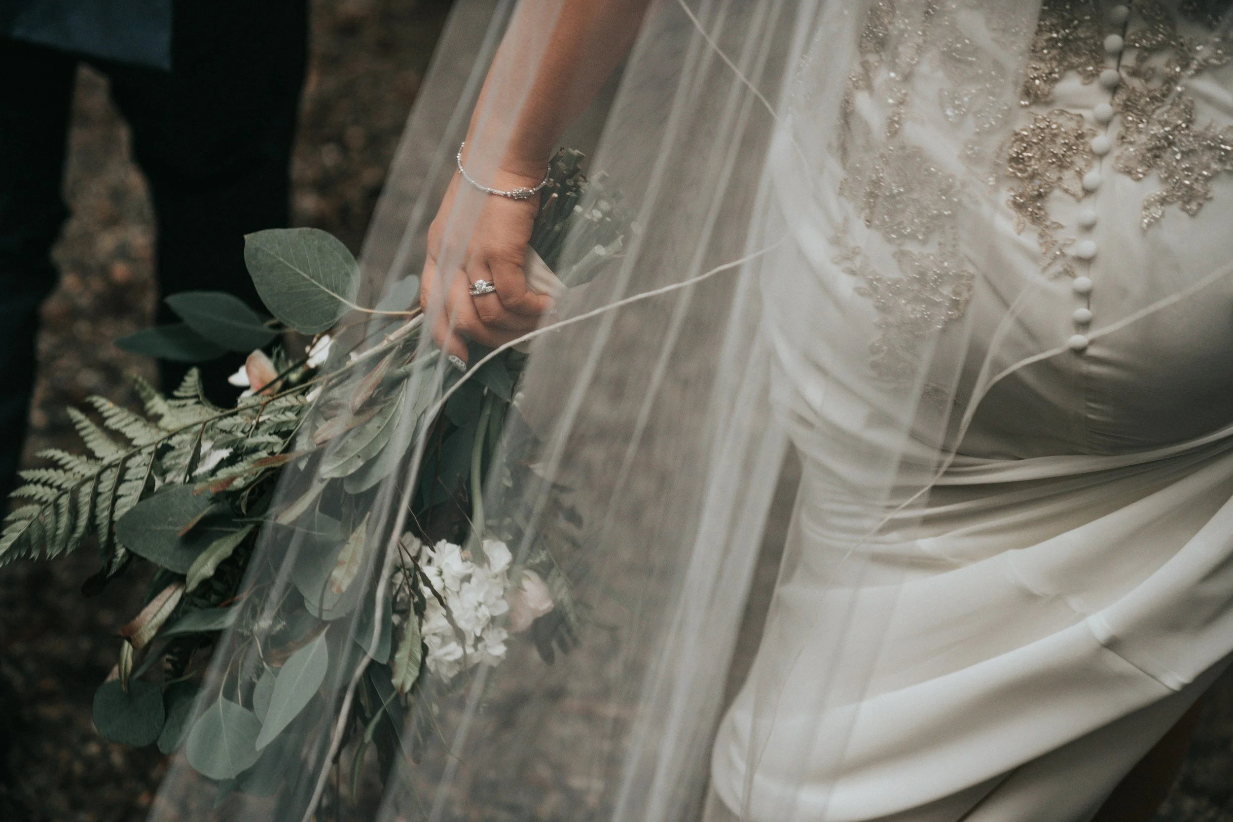 Candid post-ceremony moment of couple at Kansas City wedding, documentary style.