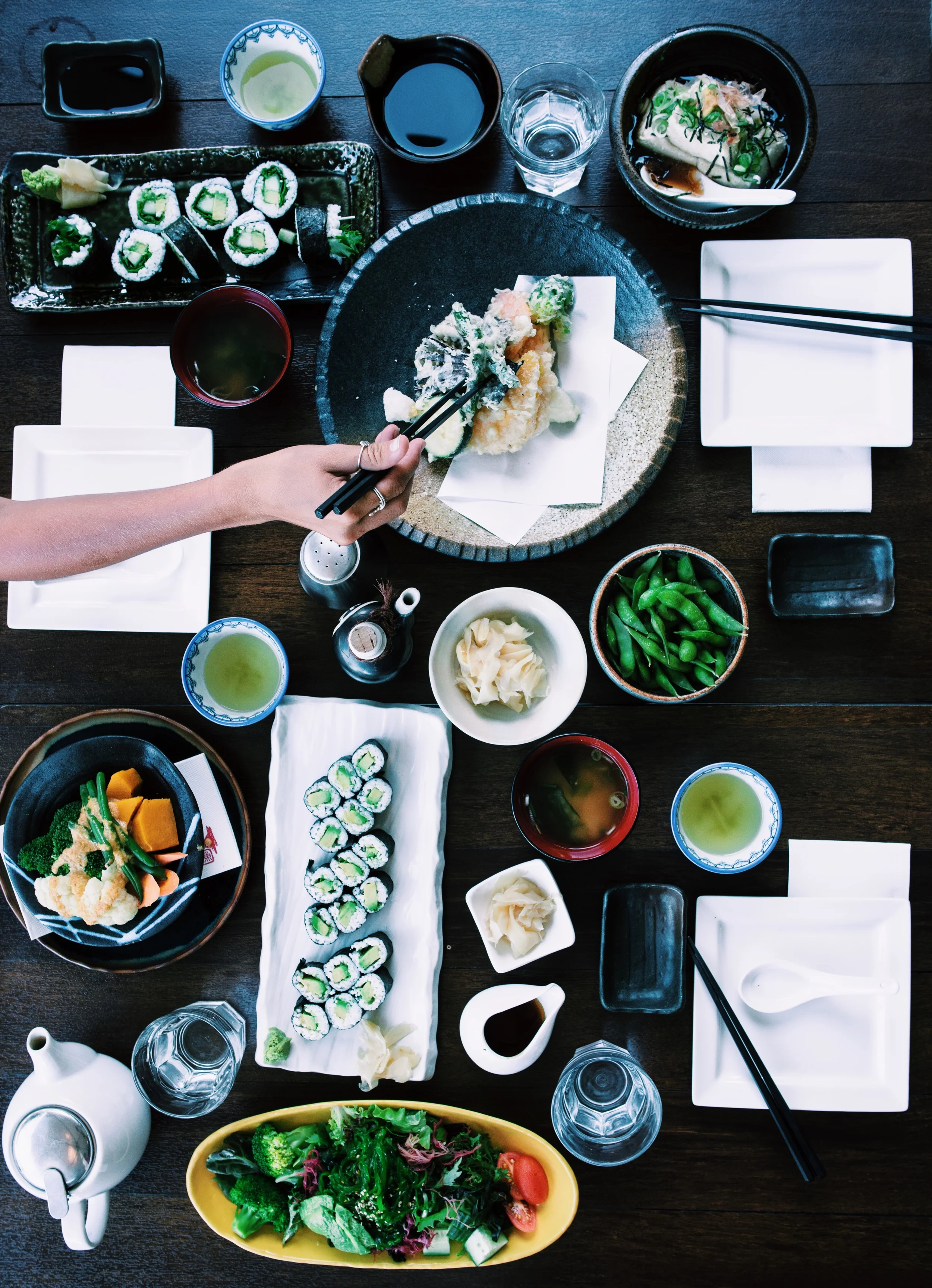 Pictured: Agedashi Tofu, Miso Soup, Avo Cucumber Rolls, Tempura Vegetables, Edemame Beans, Steamed Veggies, Avocado Hosomaki, Green Tea, and Green Wakame Salad