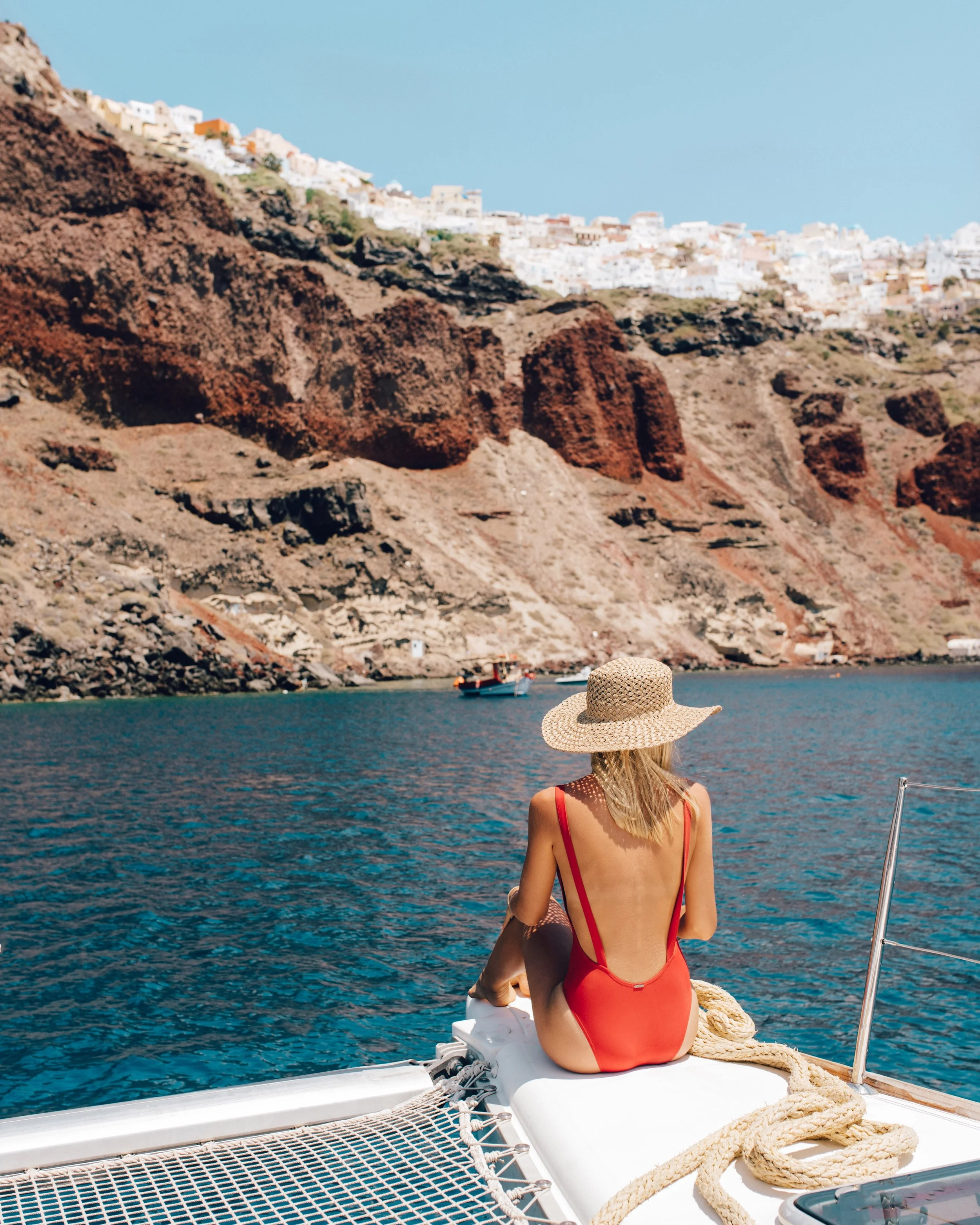 Sailing around Santorini. Bikini: mime swim