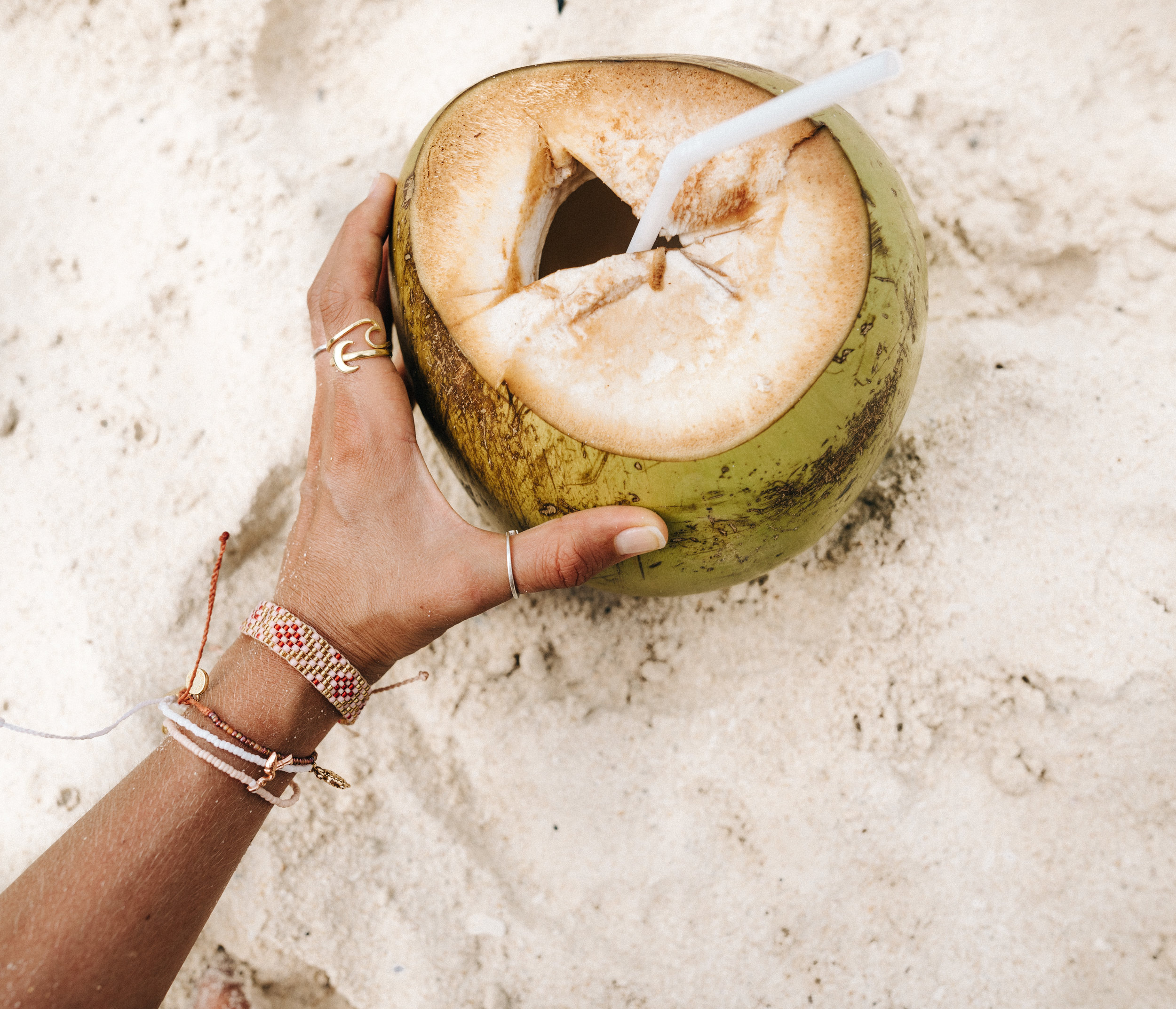 Cold coconuts to hydrate in the sun