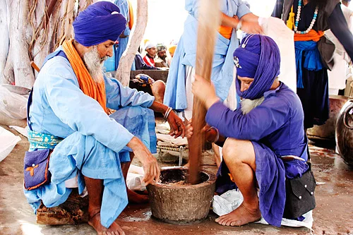 Nihang's preparing Sukhnidhaan, a Bhaang infused drink.