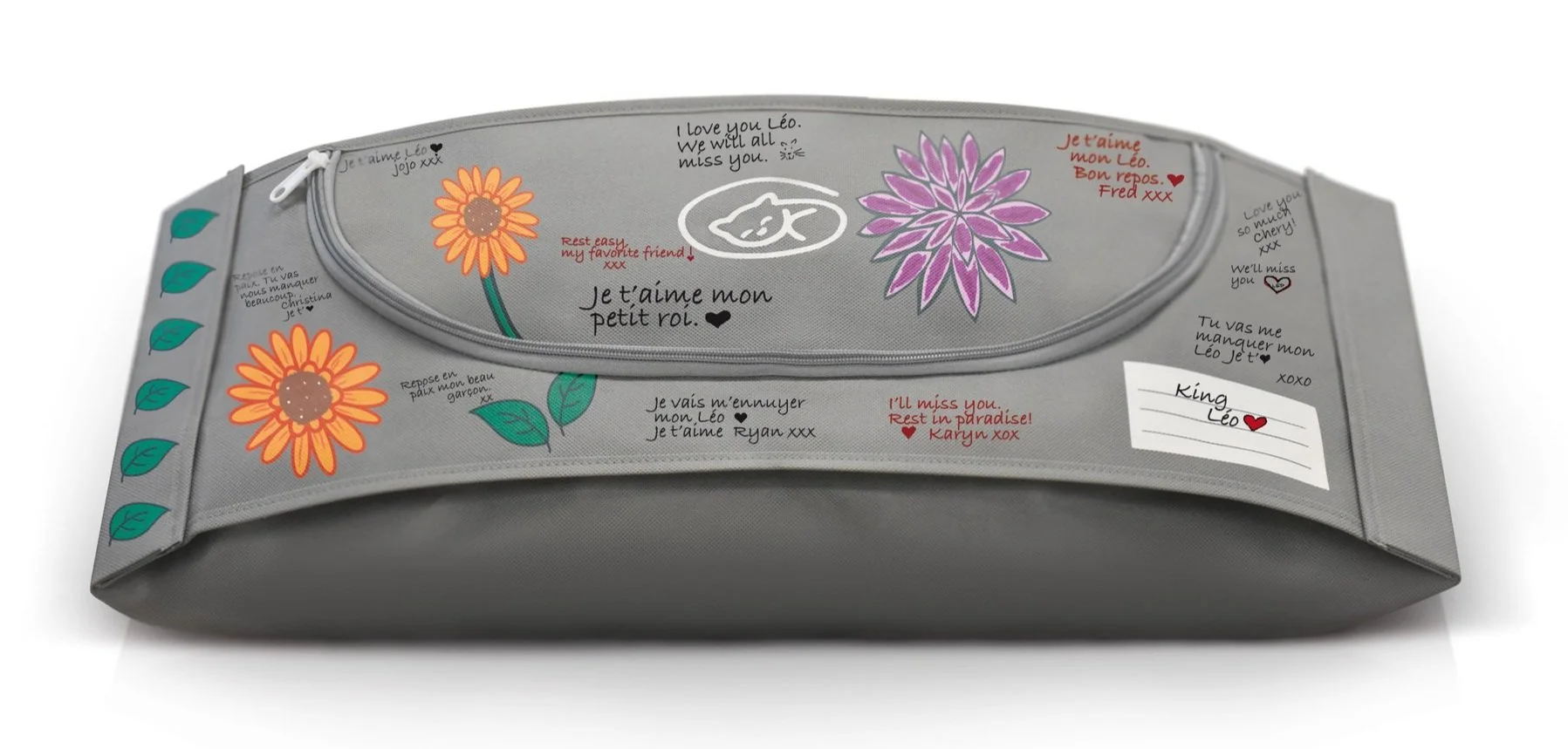 Gray EUTHABAG pet body bag personalized with colorful flowers and handwritten memorial messages for a beloved pet