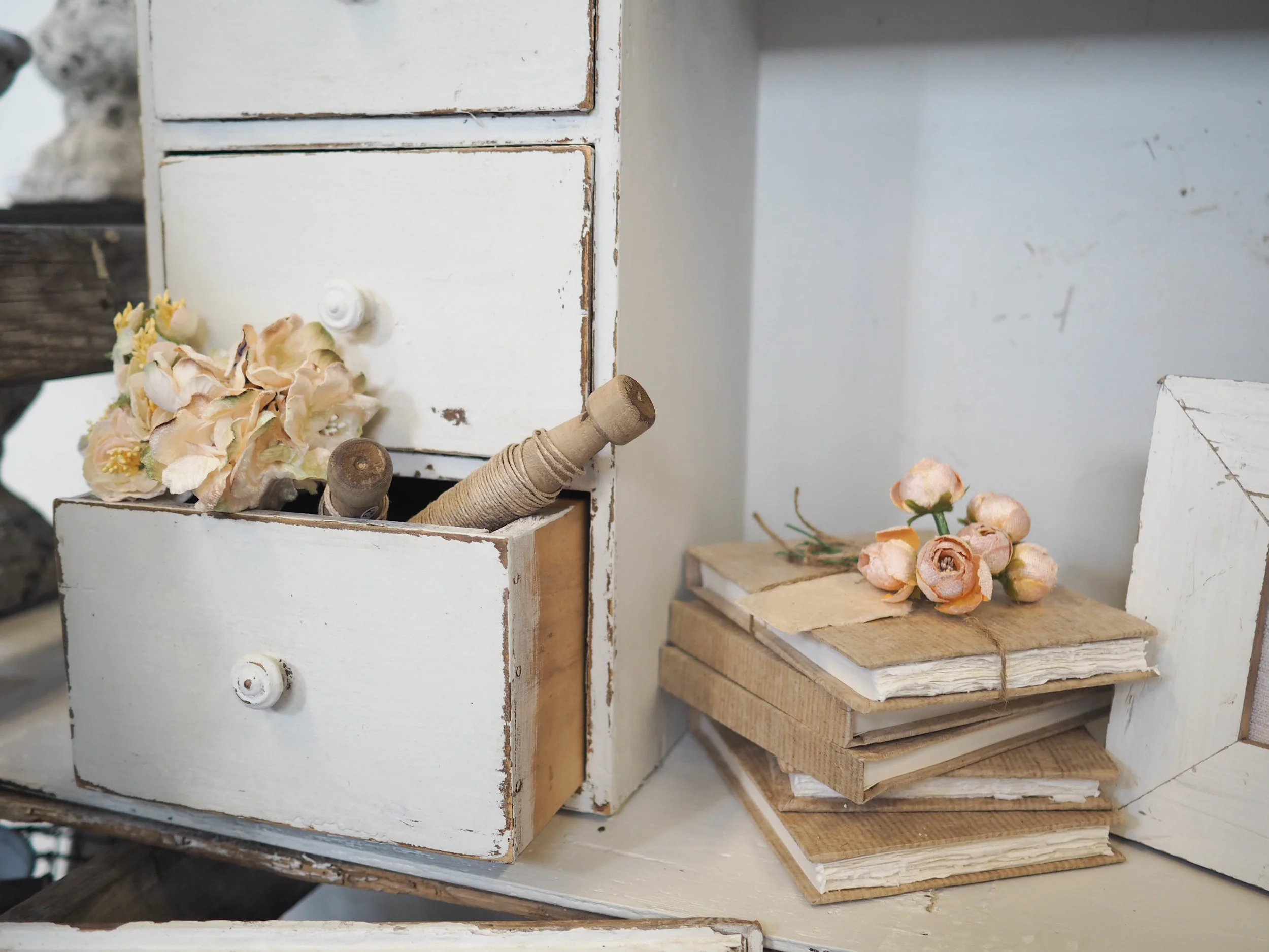 Tiny drawers, velvet flowers, linen string and handmade paper notebooks... A few of my favourite things.