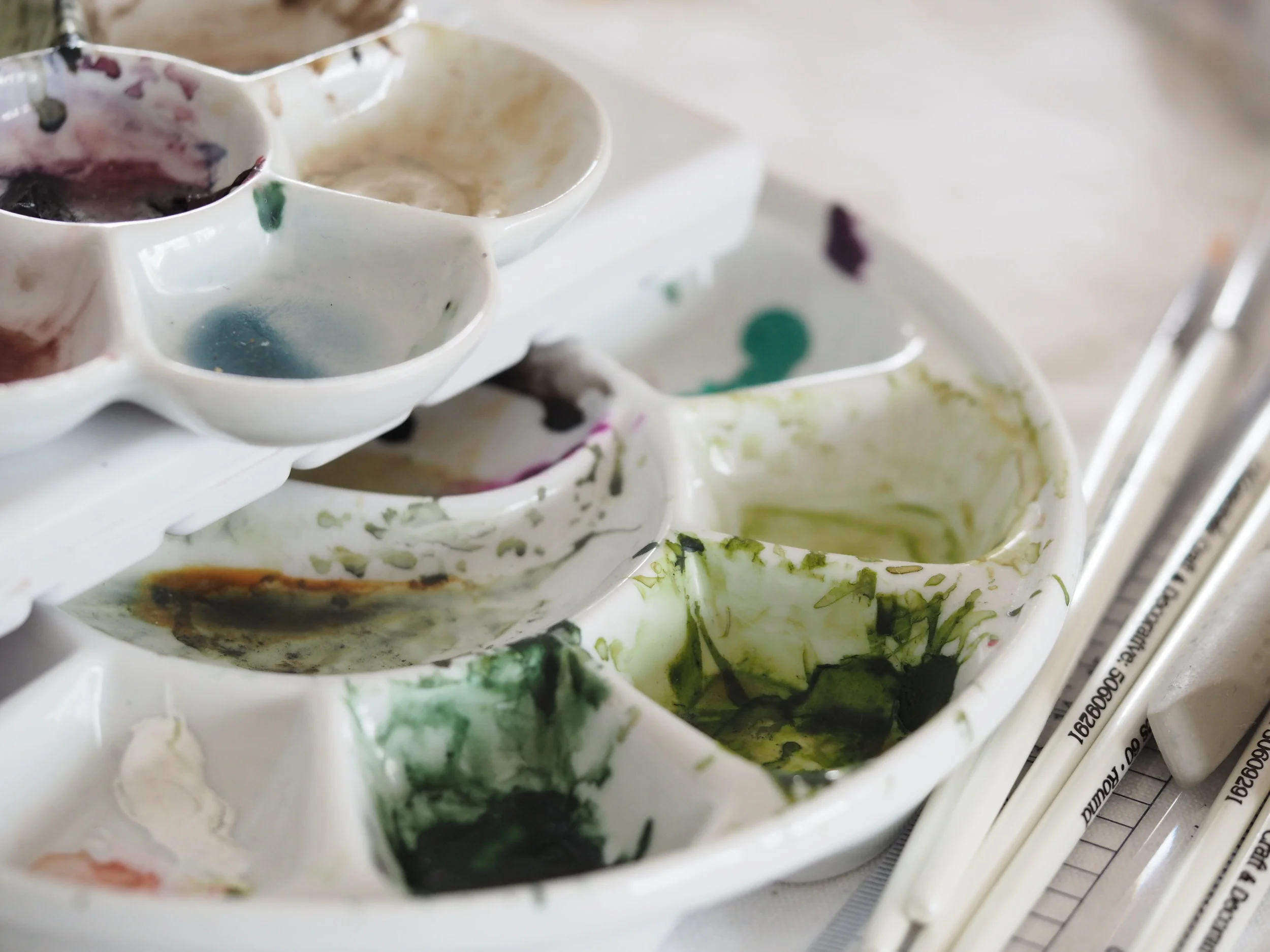 Watercolours in ceramic palettes.