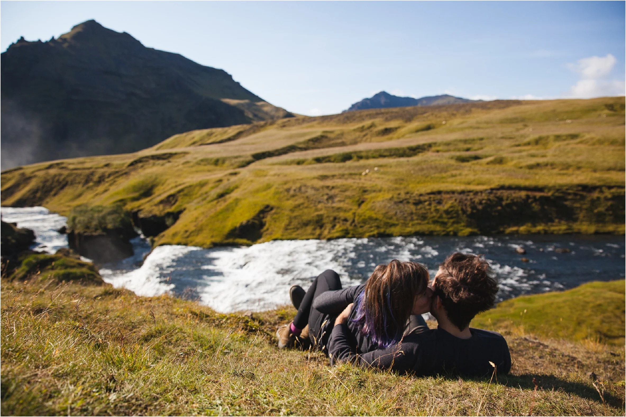 Iceland Vacation Summer, Elopement Photographer, Destination Wedding Photographer, Iceland Photographer, Iceland Elopement Photographer, Destination Wedding Photographer, Travel Wedding Photographer, Travelling Elopement Photographer, Danielle Salerno Photography, Skogafoss, Couple Laying in Grass
