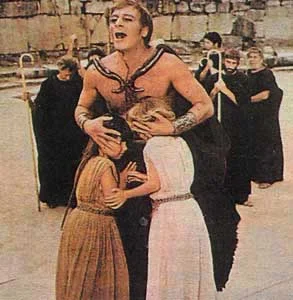 An impious king bids his children farewell.