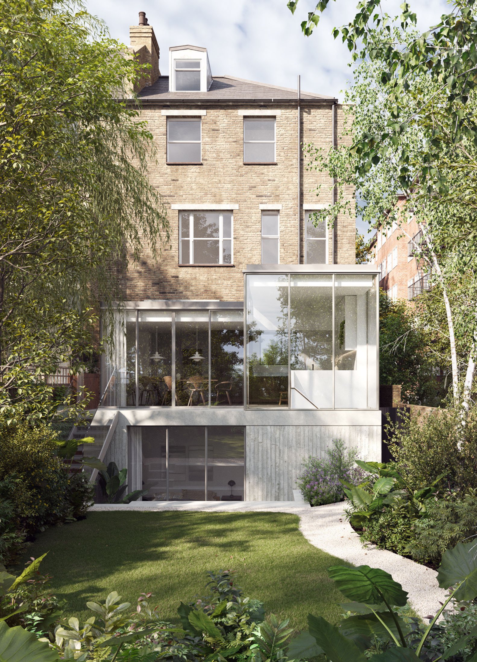Rear garden view of a modern extension to a Victorian house in London, designed as a sensitive intervention to an existing building.