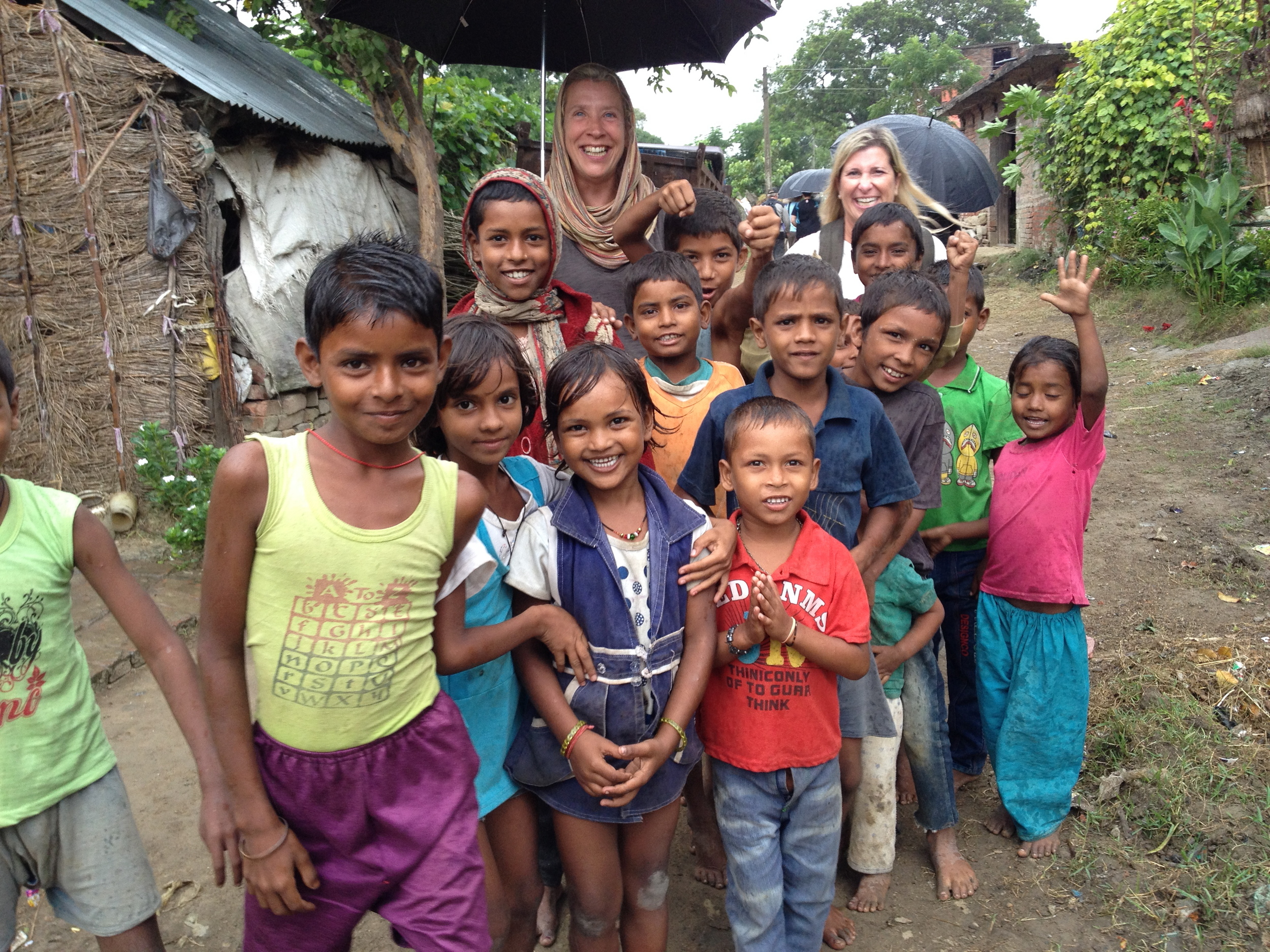On a rainy village walk through Lumbini, we gathered a crowd.