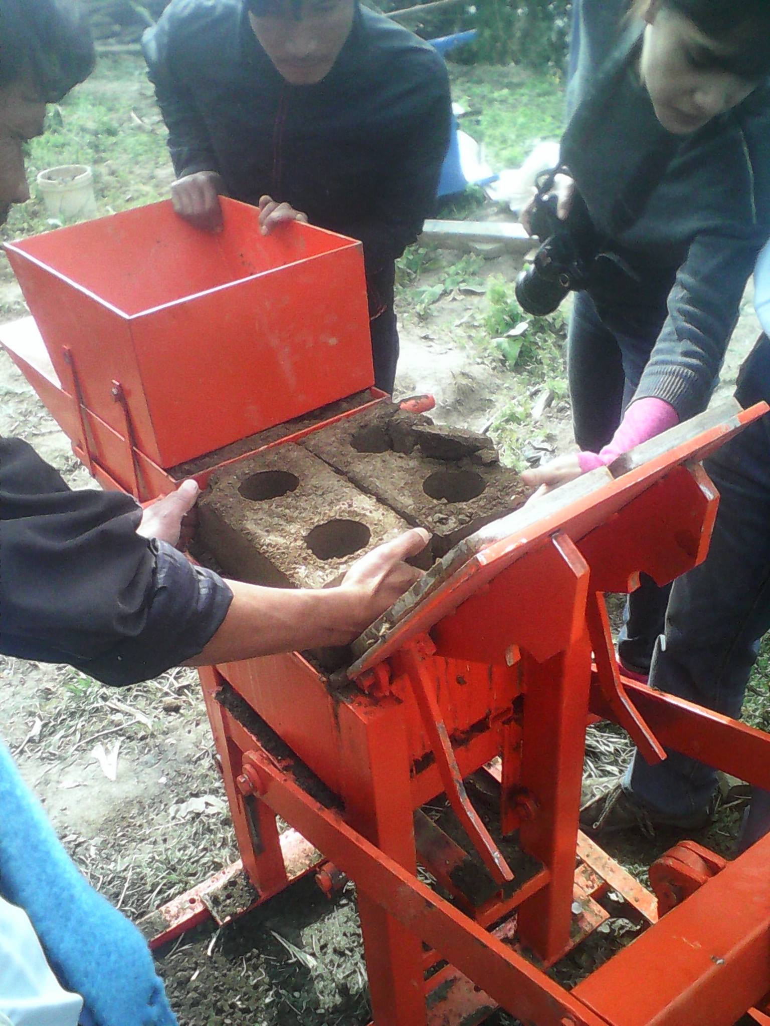 carefully removing the new bricks.jpg