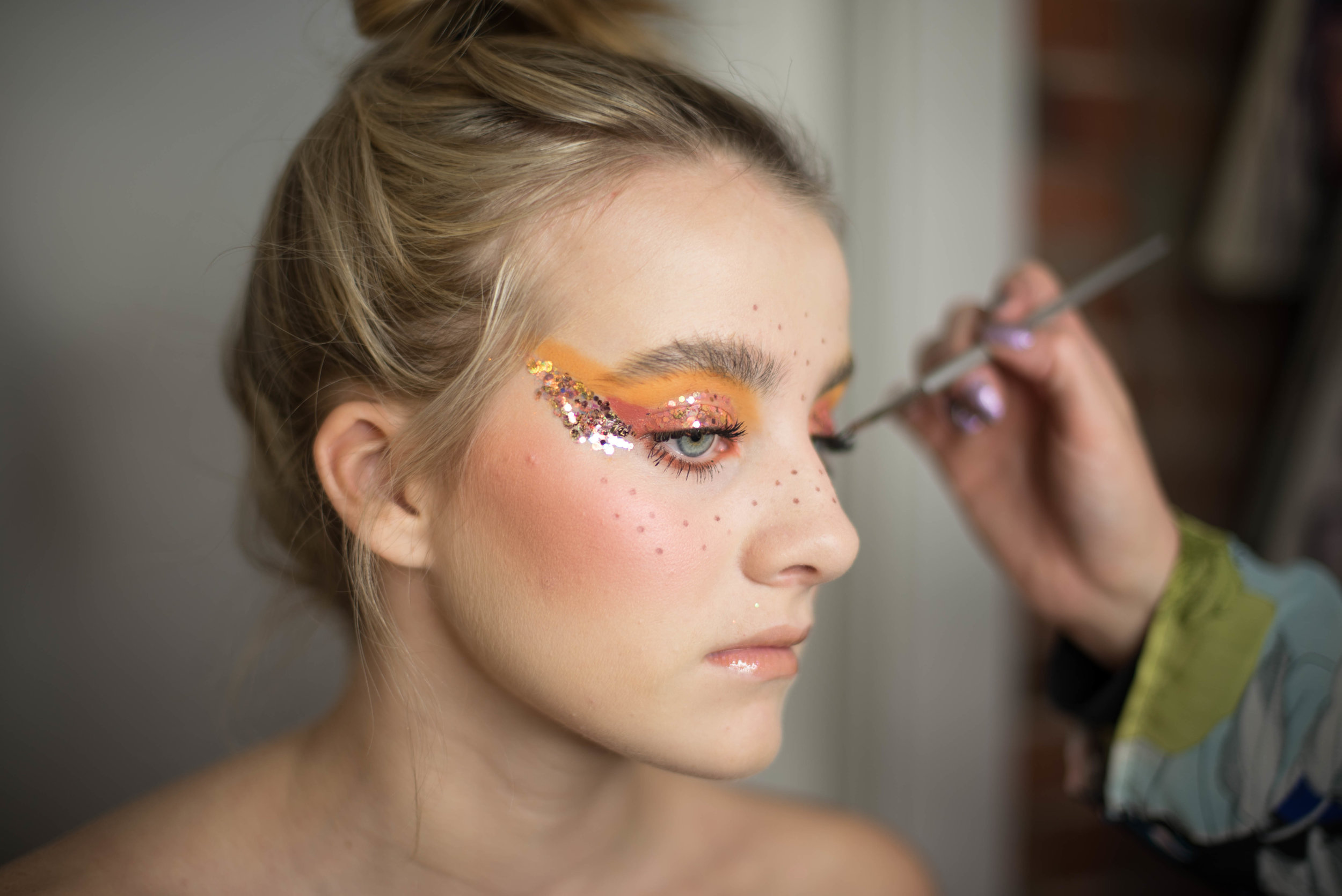 DEBRA applies GOOD WITCH to model @
