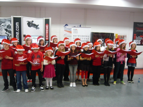Phoenix Youth Theatre pupils singing Christmas songs