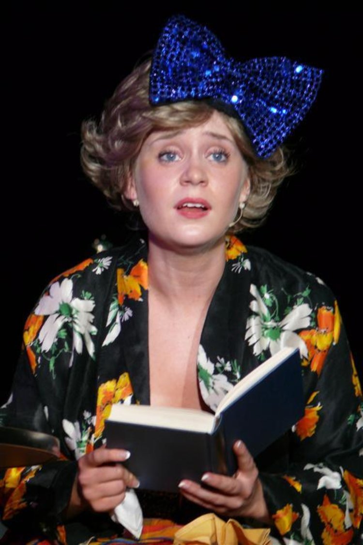 phoenix-youth-theatre-guys-and-dolls-2012-performer-reading-blue-bow.jpg