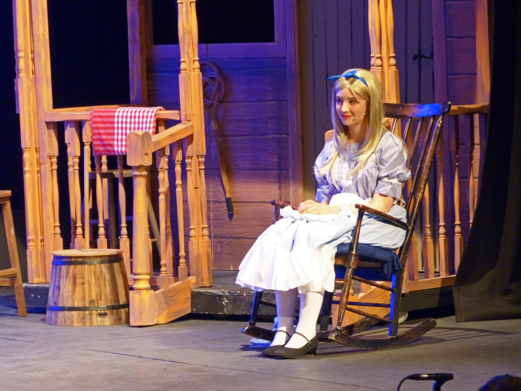 phoenix-youth-theatre-oklahoma-2016-laurey-on-porch-rocking-chair.jpg