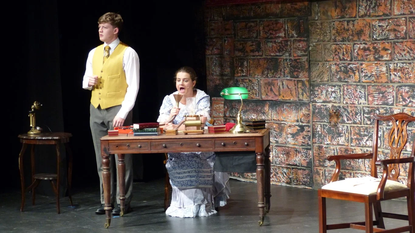 phoenix-youth-theatre-my-fair-lady-2018-speech-lesson-phonetics-desk-aberdeen.jpg