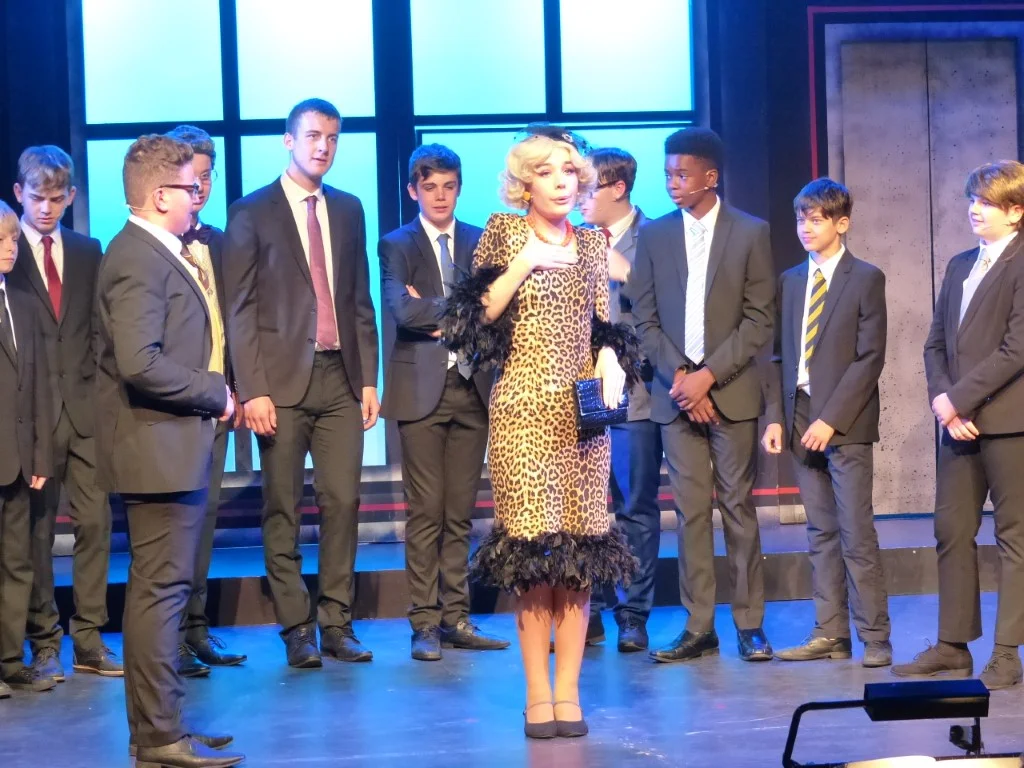 phoenix-youth-theatre-2019-how-to-succeed-leopard-print-scene.jpg