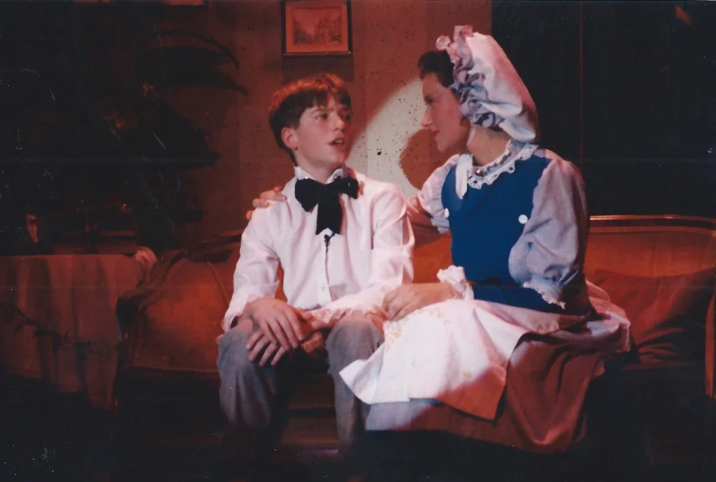 phoenix-theatre-oliver-1994-oliver-and-housekeeper-on-sofa.jpg
