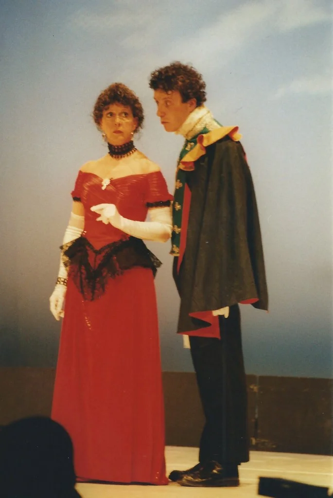 phoenix-theatre-1997-a-little-night-music-confrontation-red-gown-caped-officer.jpg