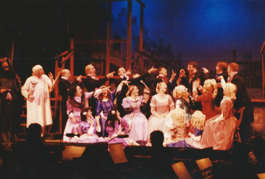 phoenix-theatre-1999-scrooge-ensemble-celebration-number-onstage.jpg