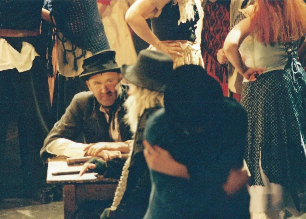 phoenix-theatre-oliver-2002-fagin-den-crowd-embrace.jpg