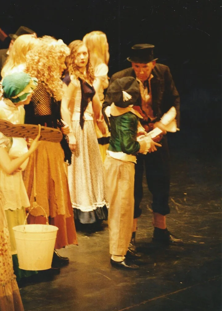 phoenix-theatre-oliver-2002-street-urchin-scolded-in-crowd.jpg