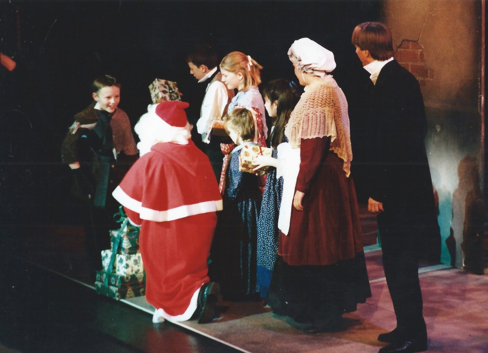 phoenix-theatre-2003-scrooge-father-christmas-gives-gifts.jpg