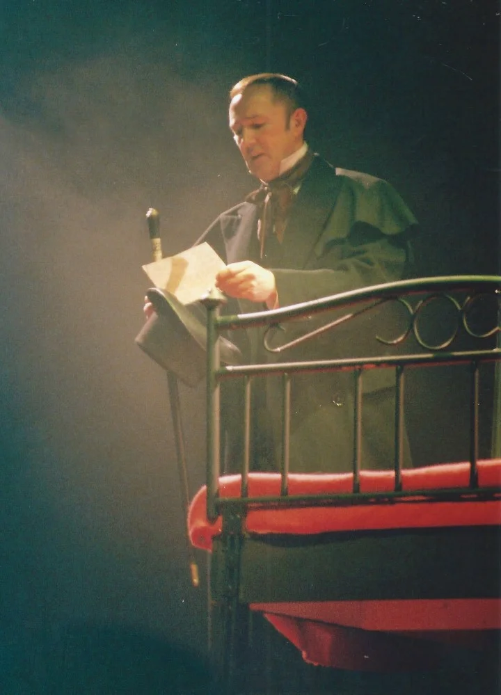 phoenix-theatre-jekyll-and-hyde-2006-victorian-gentleman-reading-letter-bed.jpg