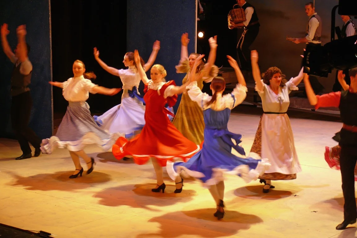 phoenix-theatre-2008-carousel-ensemble-dancers-twirl-period-dresses.jpg