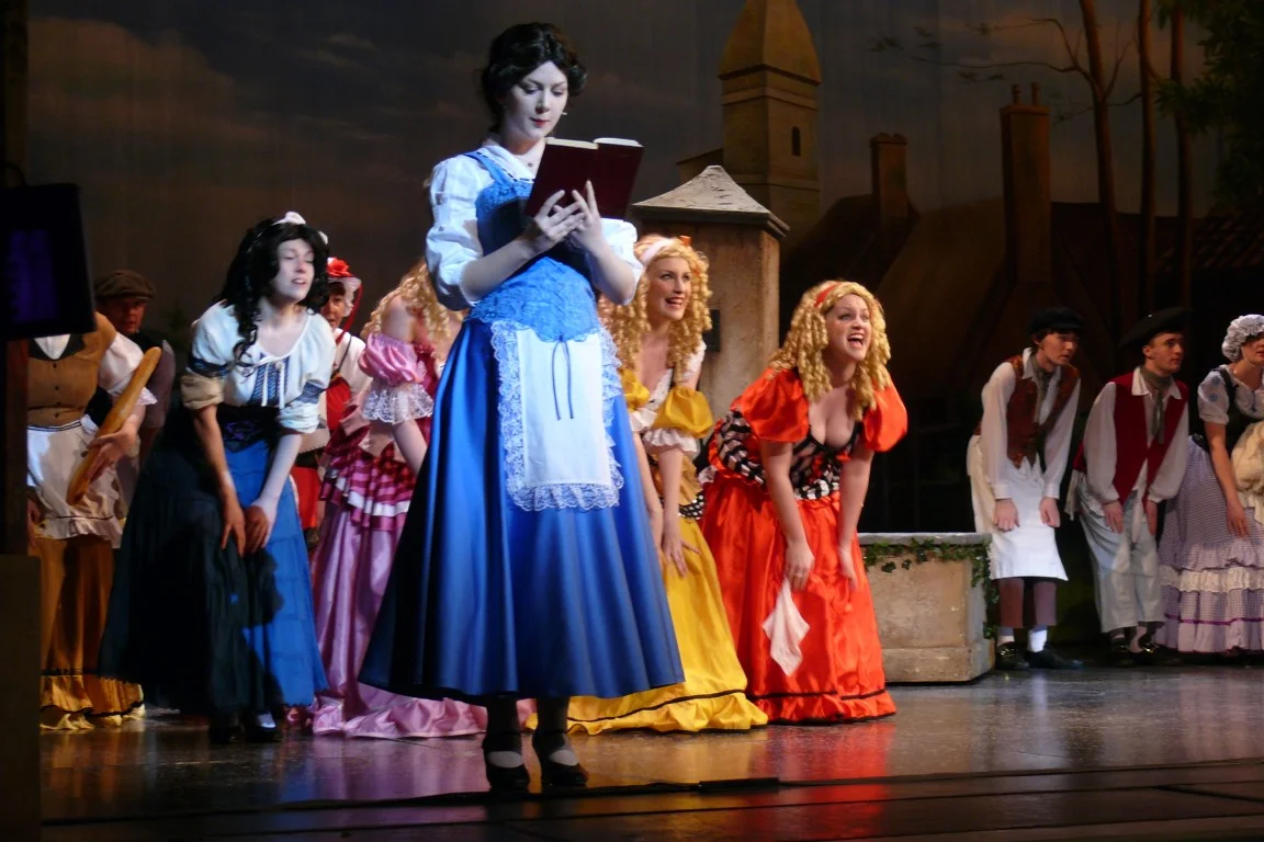 phoenix-theatre-2011-beauty-and-the-beast-belle-reading-village-scene.jpg