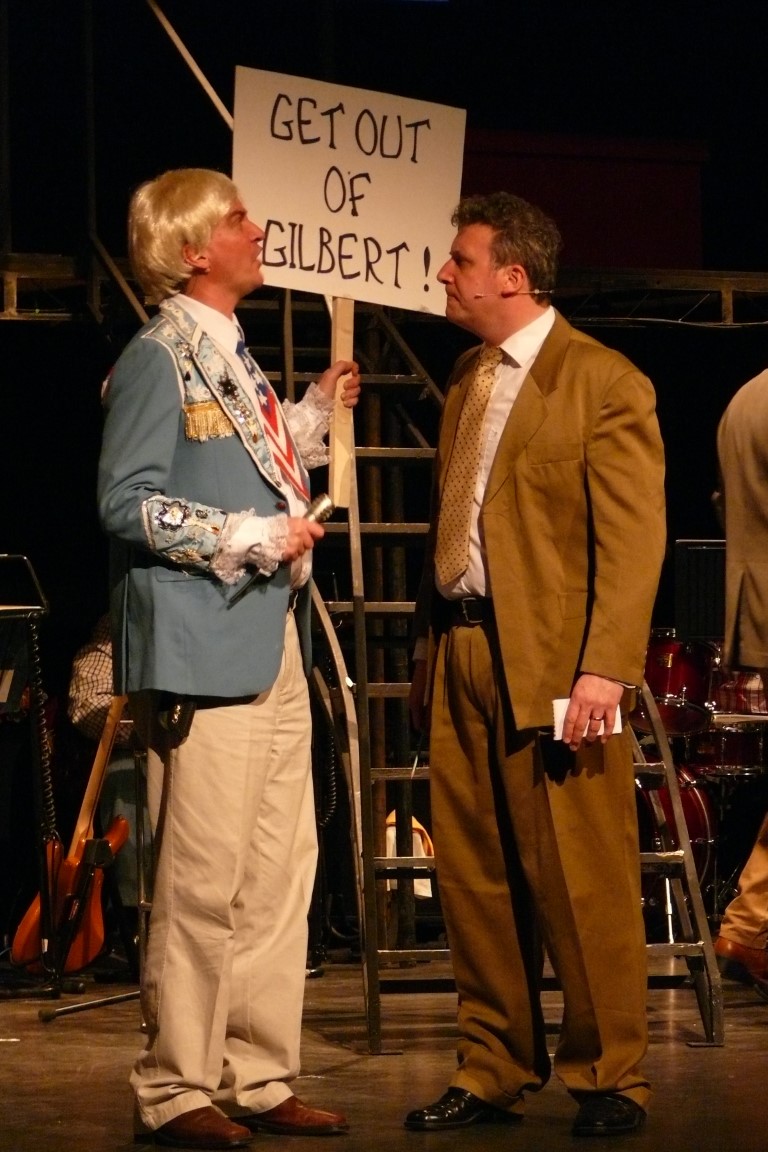 phoenix-theatre-best-little-whorehouse-in-texas-2012-protest-scene-get-out-of-gilbert-sign.jpg