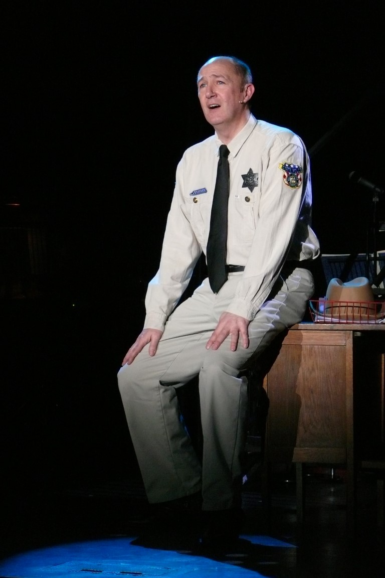 phoenix-theatre-best-little-whorehouse-in-texas-2012-sheriff-solo-blue-spotlight.jpg