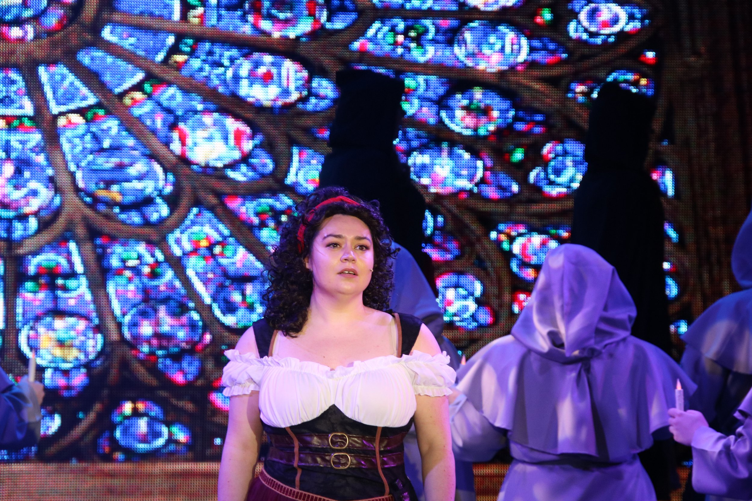 the-hunchback-of-notre-dame-2022-phoenix-theatre-esmeralda-solo-rose-window-monks-candles-aberdeen-arts-centre-aberdeen-scotland.jpg
