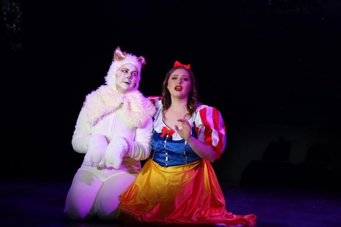 snow-white-2022-pantomime-phoenix-theatre-phoenix-youth-theatre-snow-white-with-cat-character-kneeling.jpg