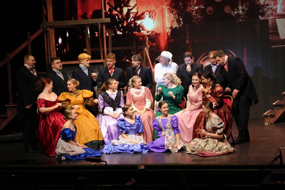 scrooge-2023-party-ensemble-colourful-gowns-phoenix-theatre-aberdeen.jpg