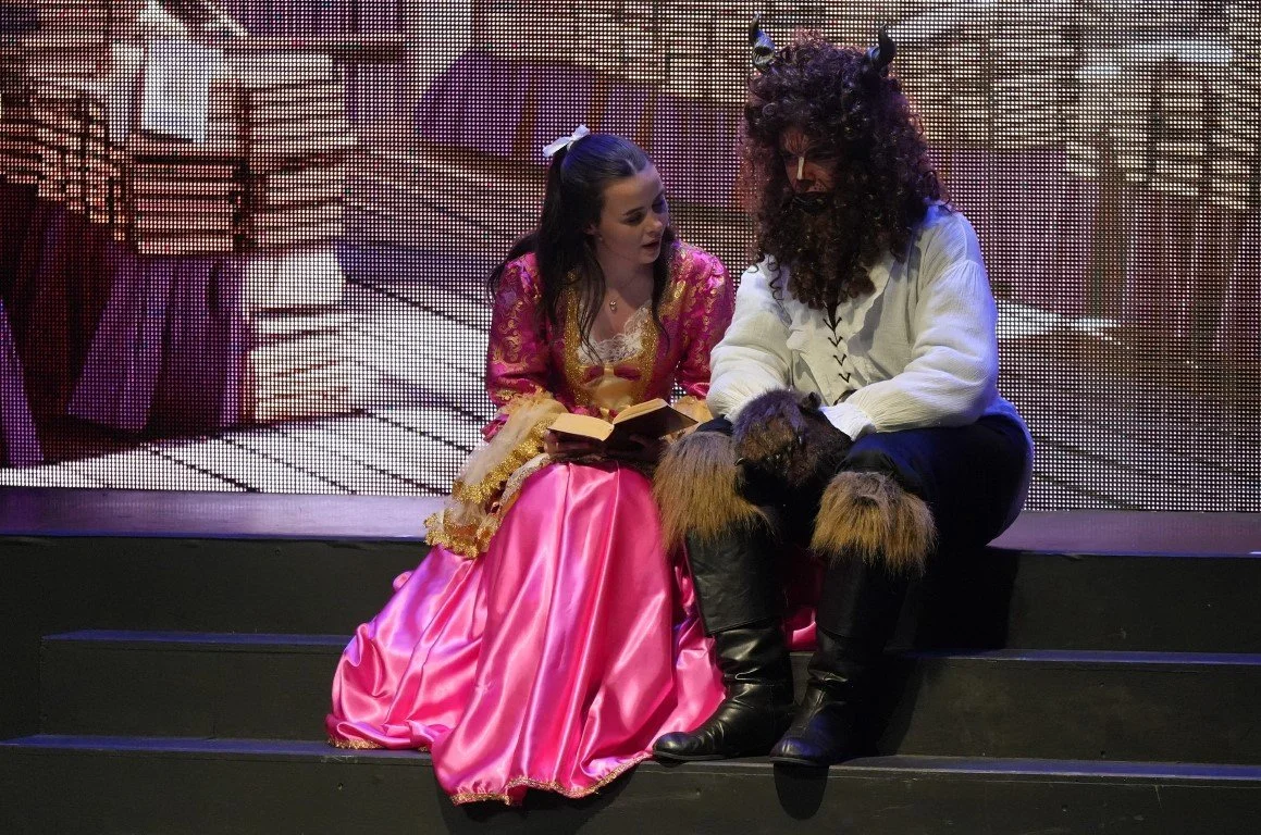 pyt-beauty-and-the-beast-2024-belle-reads-to-beast-library.jpg