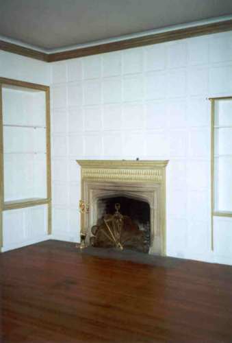  This is the same original room with the furniture removed. Note the size of the fireplace. 