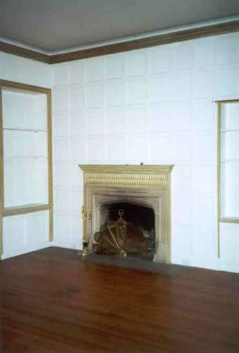 This is the same original room with the furniture removed. Note the size of the fireplace.