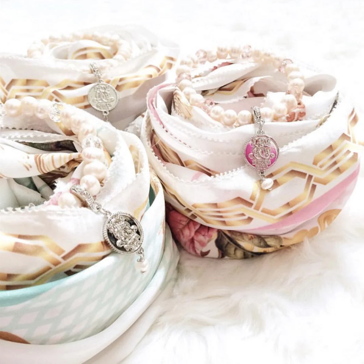 The collection glimmers in gold and white in 3 pastel hues of jade, pink, and grey. Picture Credit to @thedUCkgroup and @bowerhaus instagram