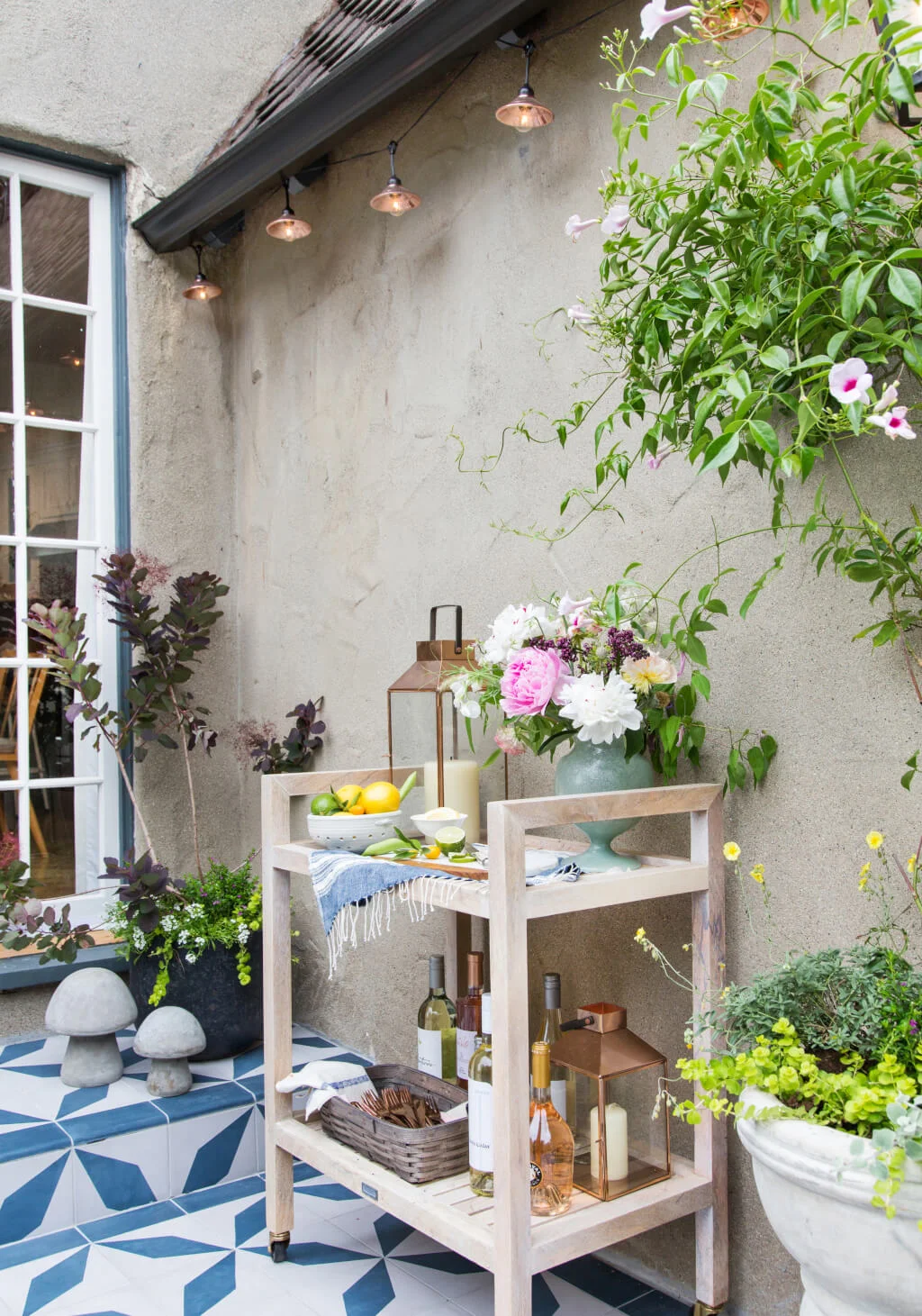 Emily-Henderson_House-Beautiful_Courtyard_Tile_Modern_English_Country_15-1024x1461.jpg
