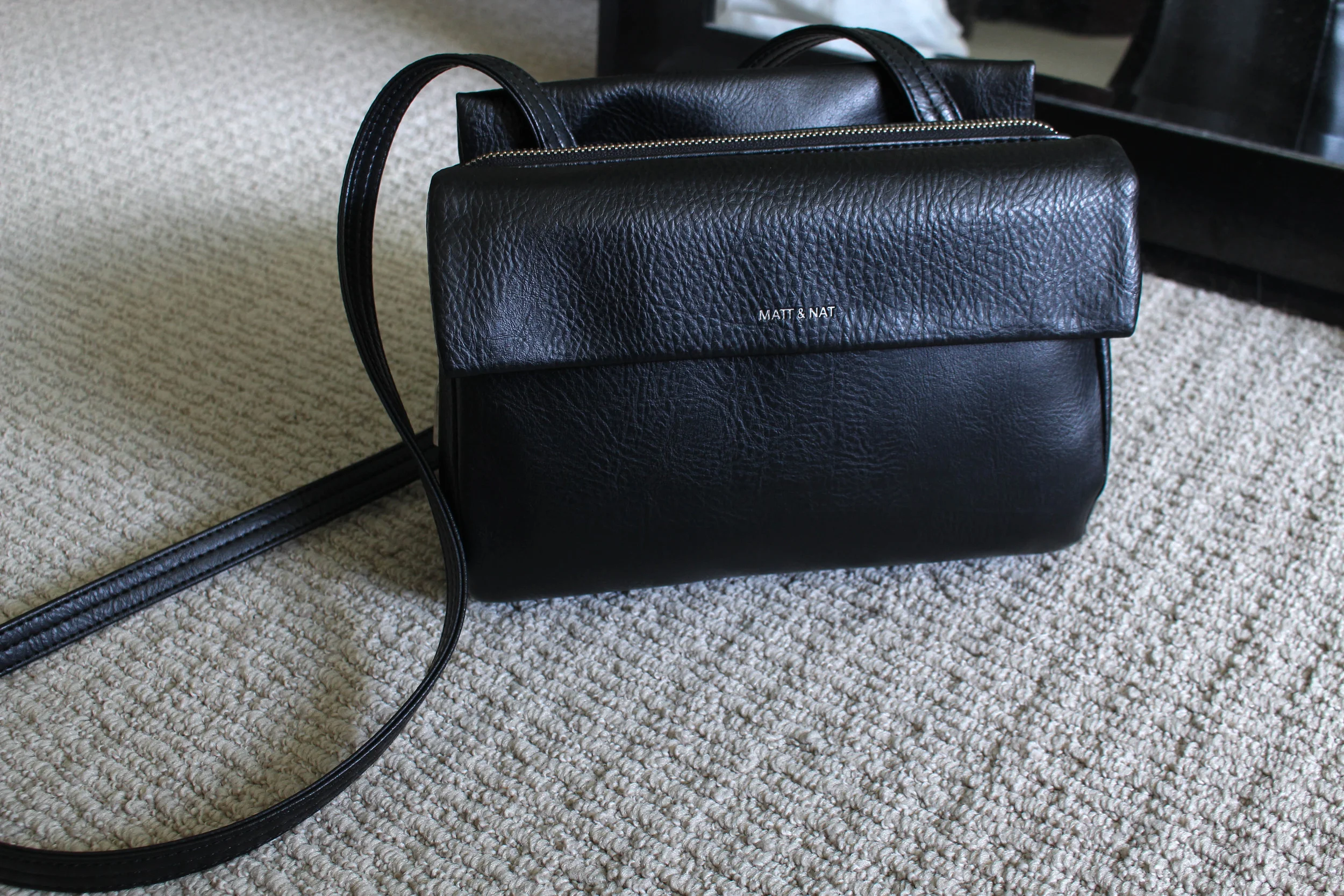 RETAILS AT $125 ON MATT & NAT WEBSITE 