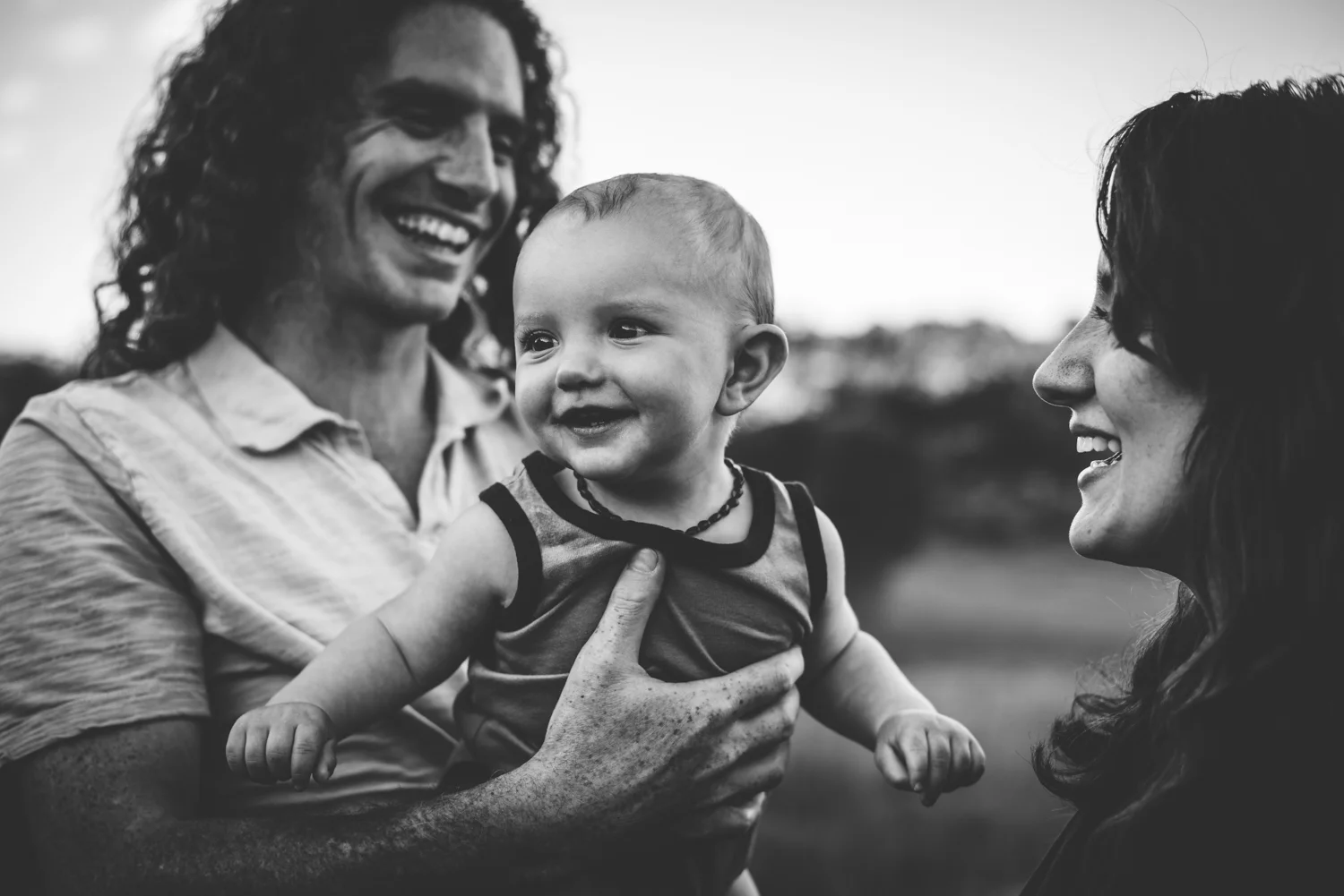 Family loves on their son in Garden of the Gods session in Colorado Springs.