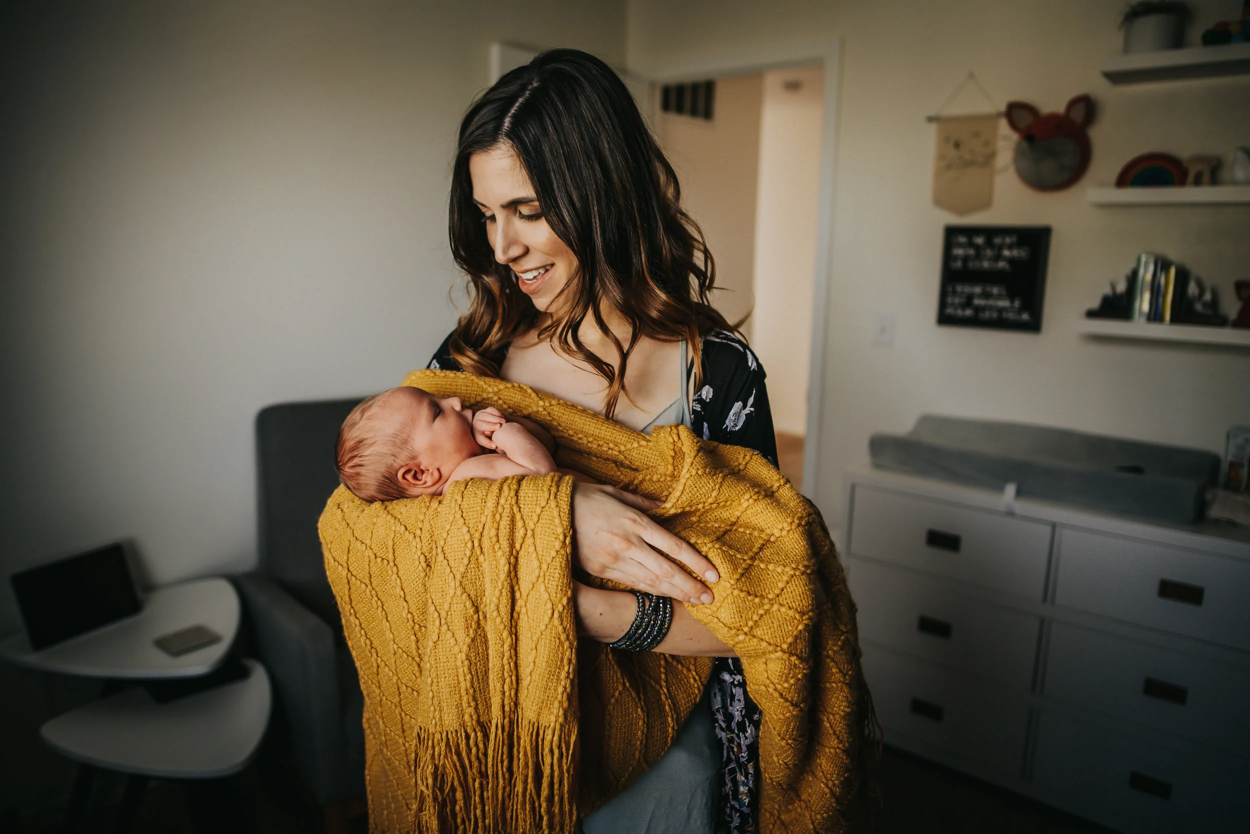 New mother holds her baby just days after delivery in Colorado Springs.