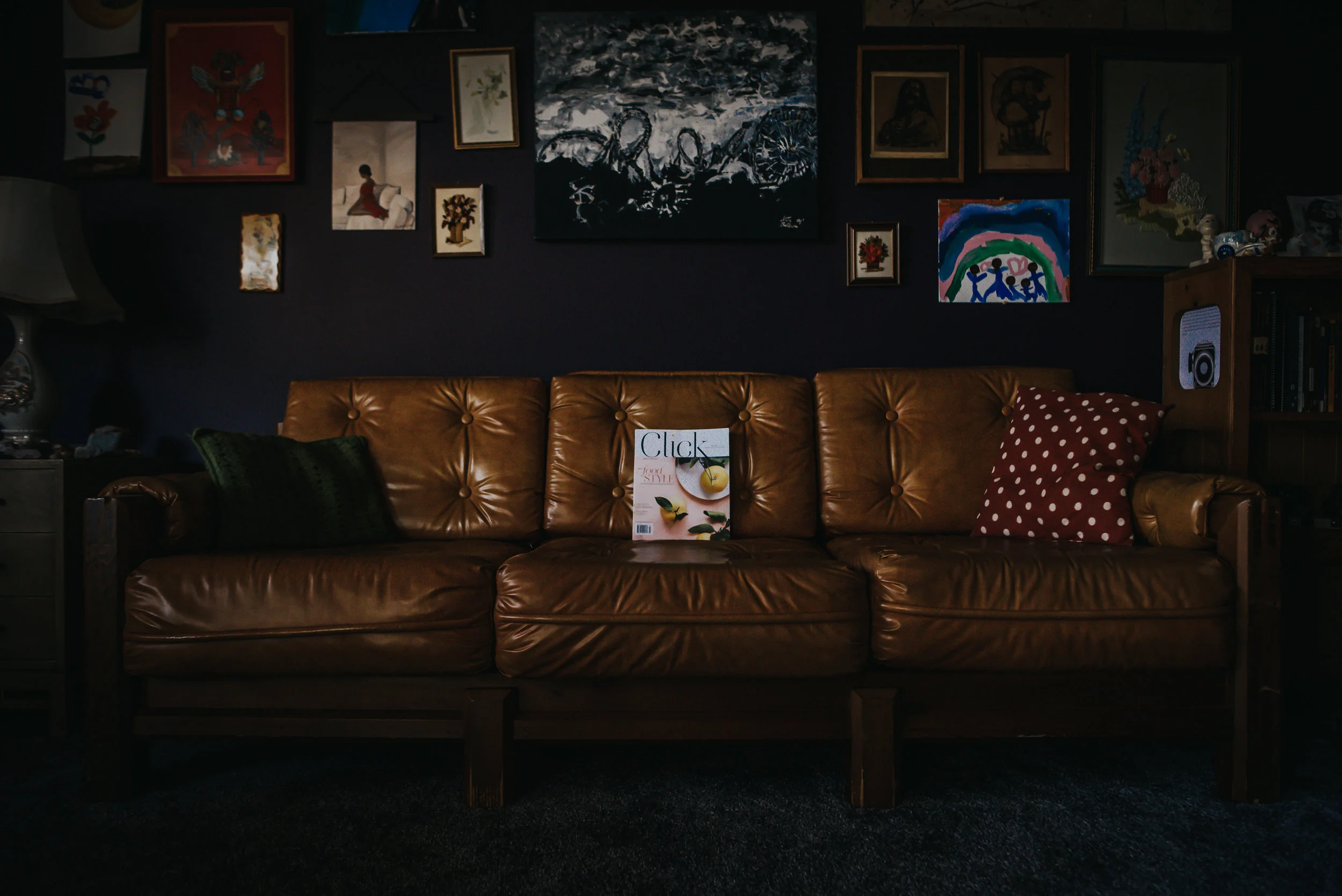 Colorado Photographer markets Click and Company Magazine in vintage living room.